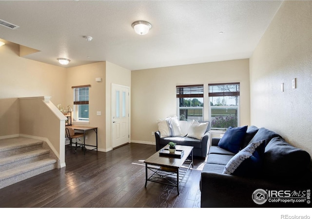 3051 County Fair Ln Unit 2, Fort Collins, CO 80528 - living area featuring wood-type flooring, baseboards, and stairway