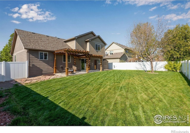 rear view of property with a pergola, a patio, and a shingled roof