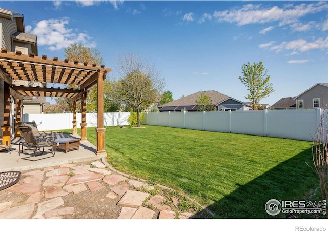 view of yard with a pergola and a patio