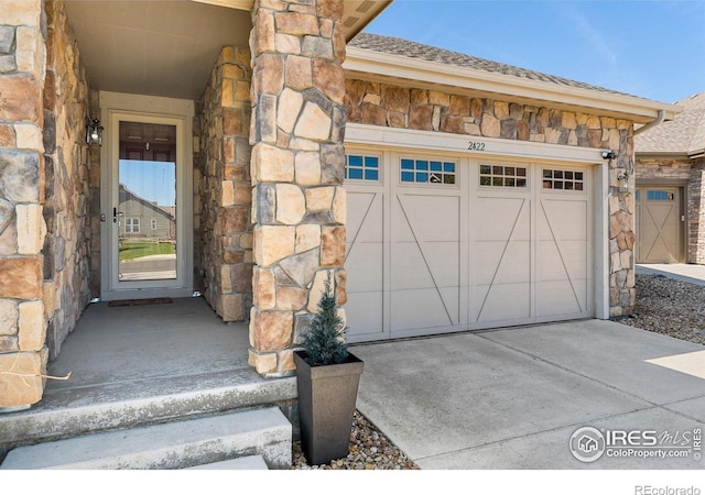 garage featuring driveway