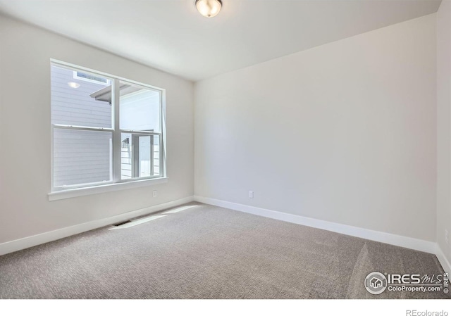 1679 Crystalline Dr, Windsor, CO 80550 - unfurnished room with carpet and baseboards