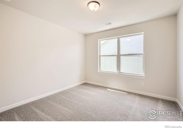 1679 Crystalline Dr, Windsor, CO 80550 - spare room featuring baseboards and carpet flooring