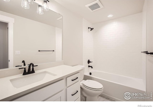 1679 Crystalline Dr, Windsor, CO 80550 - bathroom featuring toilet, vanity, tub / shower combination, and recessed lighting