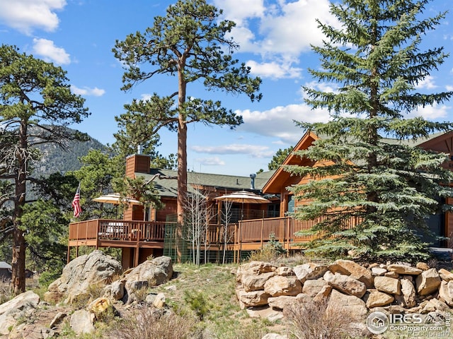 658 Cedar Ridge Cir, Estes Park, CO 80517 - view of yard with a deck
