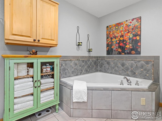 658 Cedar Ridge Cir, Estes Park, CO 80517 - bathroom with tile patterned flooring and a bath