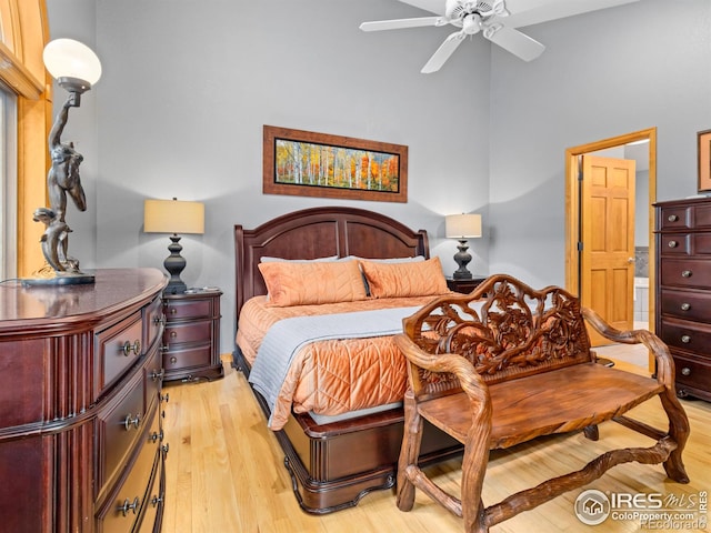 658 Cedar Ridge Cir, Estes Park, CO 80517 - bedroom featuring light wood-type flooring and a towering ceiling