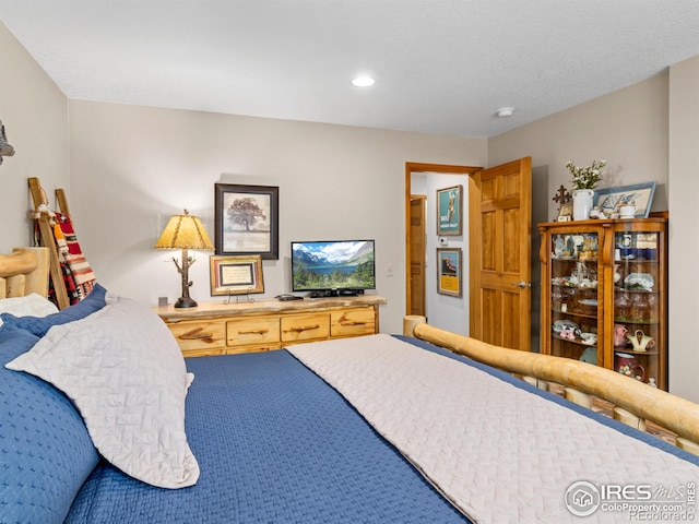 658 Cedar Ridge Cir, Estes Park, CO 80517 - carpeted bedroom featuring recessed lighting