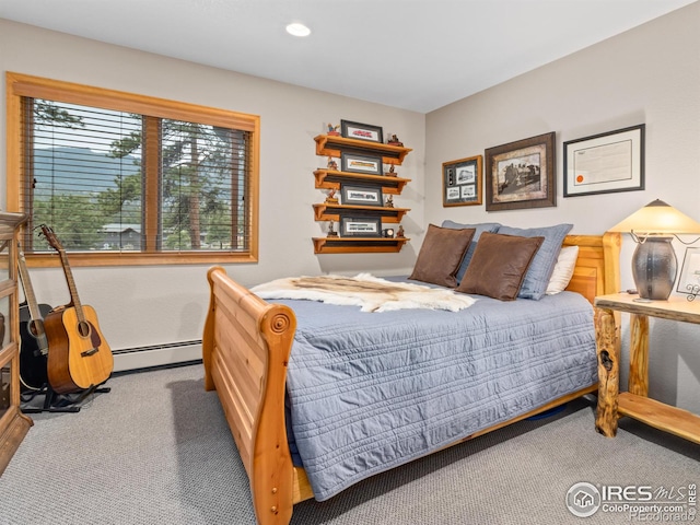 658 Cedar Ridge Cir, Estes Park, CO 80517 - bedroom featuring carpet floors, a baseboard heating unit, baseboards, and recessed lighting