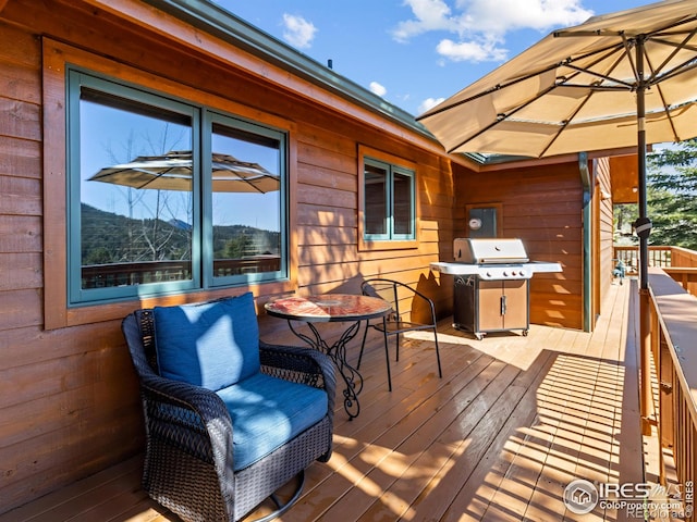 658 Cedar Ridge Cir, Estes Park, CO 80517 - deck with grilling area and outdoor dining area