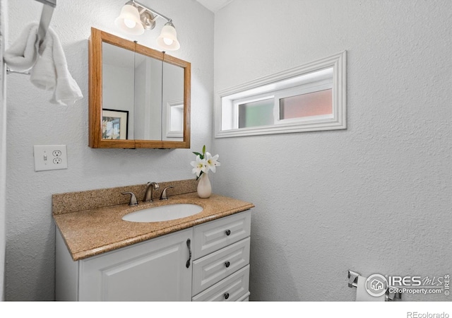 bathroom featuring vanity
