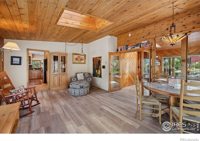 1433 Vista View Ln, Estes Park, CO 80517 - dining space with wood ceiling, light wood-style floors, and lofted ceiling