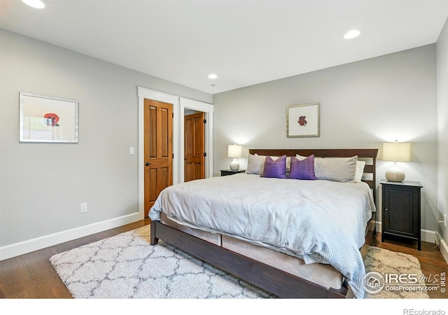3059 6th St, Boulder, CO 80304 - bedroom with baseboards, wood finished floors, and recessed lighting
