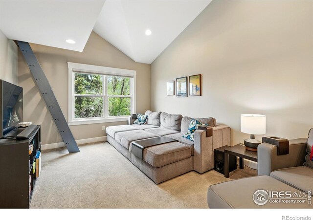 3059 6th St, Boulder, CO 80304 - carpeted living room featuring vaulted ceiling, recessed lighting, and baseboards