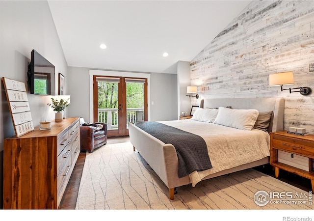 3059 6th St, Boulder, CO 80304 - bedroom with access to outside, wood walls, recessed lighting, wood finished floors, and an accent wall
