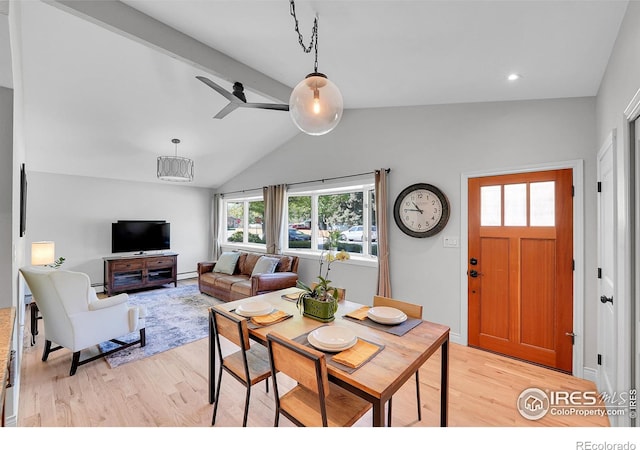 dining space featuring light wood-style flooring, a ceiling fan, a baseboard heating unit, and baseboard heating