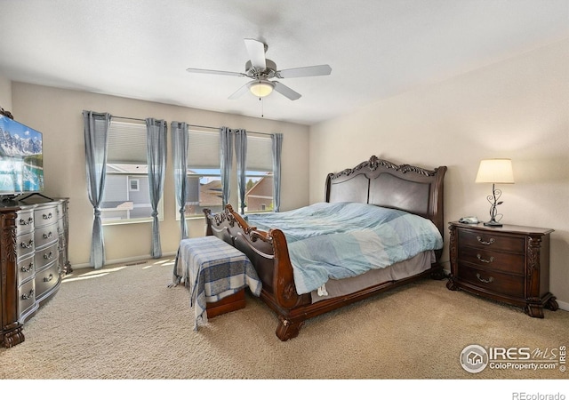 bedroom featuring carpet floors and a ceiling fan