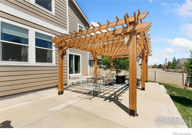view of patio / terrace with fence and a pergola