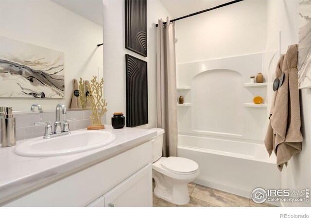 7167 Gateway Crossing St, Wellington, CO 80549 - full bathroom featuring toilet, shower / tub combo, and vanity