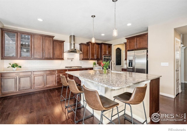 2150 Blue Yonder Way, Fort Collins, CO 80525 - kitchen with wall chimney exhaust hood, appliances with stainless steel finishes, a sink, dark wood-style floors, and recessed lighting