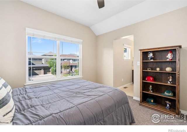 2150 Blue Yonder Way, Fort Collins, CO 80525 - bedroom with lofted ceiling, carpet floors, baseboards, and a ceiling fan