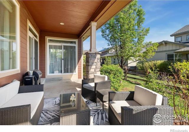 2150 Blue Yonder Way, Fort Collins, CO 80525 - view of patio featuring outdoor lounge area and fence