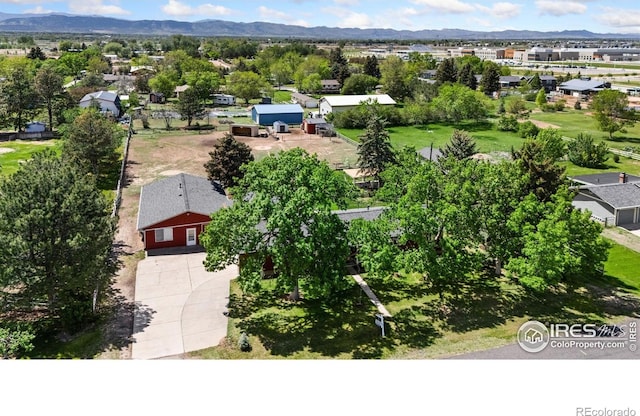 aerial view of residential area with a mountainous background