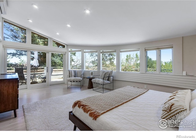 505 Geneva Ave, Boulder, CO 80302 - bedroom with multiple windows, access to outside, recessed lighting, and wood finished floors