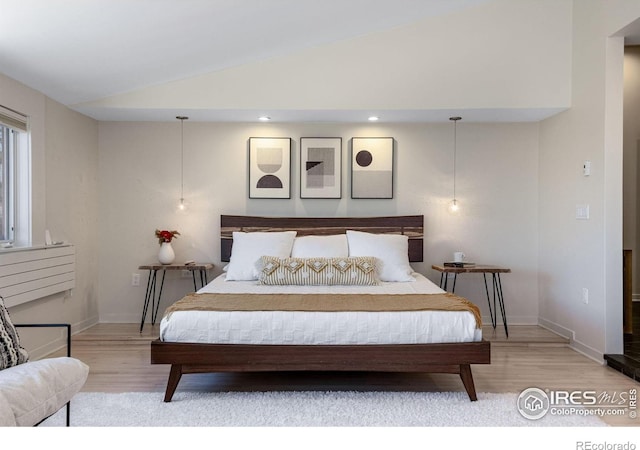 505 Geneva Ave, Boulder, CO 80302 - bedroom featuring lofted ceiling, light wood finished floors, and baseboards