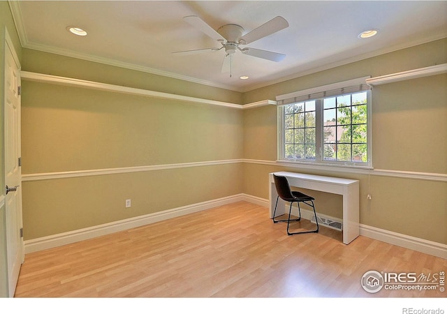unfurnished office with wood finished floors, ornamental molding, ceiling fan, recessed lighting, and baseboards