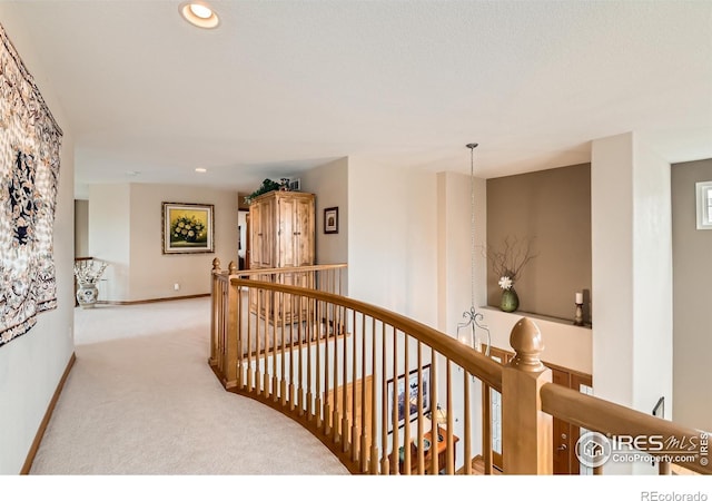 14180 Whitney Cir, Broomfield, CO 80023 - corridor with an upstairs landing, carpet, baseboards, and recessed lighting