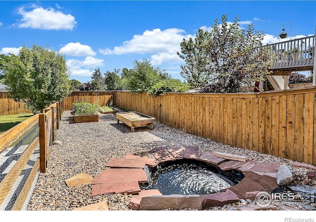 920 Wagon Bend Rd, Berthoud, CO 80513 - fenced backyard with a garden