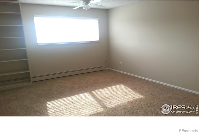 4150 Monroe Dr Unit C, Boulder, CO 80303 - empty room with a baseboard heating unit, a ceiling fan, carpet, a textured ceiling, and baseboards