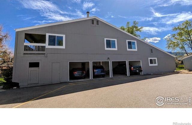 4150 Monroe Dr Unit C, Boulder, CO 80303 - back of house featuring a parking lot