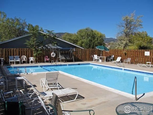 4150 Monroe Dr Unit C, Boulder, CO 80303 - community pool with a patio area and fence