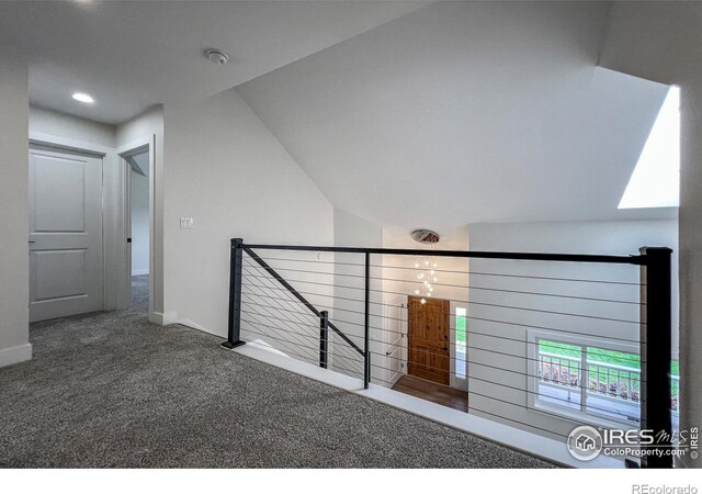 5978 Scotswood Ct, Boulder, CO 80301 - hallway with carpet floors, an upstairs landing, recessed lighting, lofted ceiling, and baseboards