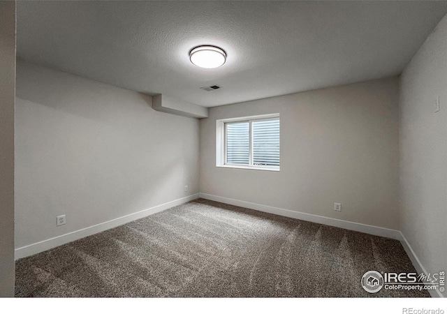 5978 Scotswood Ct, Boulder, CO 80301 - unfurnished room featuring carpet floors, baseboards, and a textured ceiling