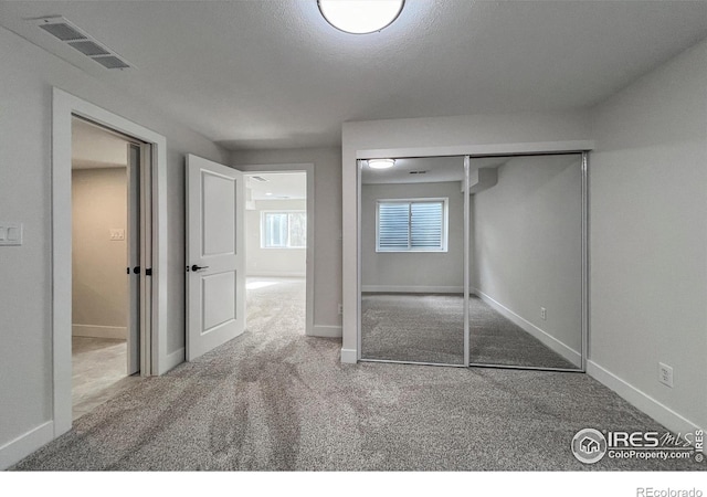 5978 Scotswood Ct, Boulder, CO 80301 - unfurnished bedroom with carpet floors, baseboards, and a closet