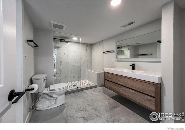 5978 Scotswood Ct, Boulder, CO 80301 - full bathroom featuring toilet, marble look tiles, a marble finish shower, vanity, and recessed lighting