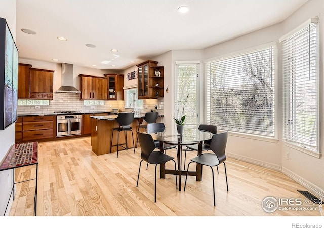933 Xenon Ct, Golden, CO 80401 - dining room with light wood-style flooring, baseboards, and recessed lighting