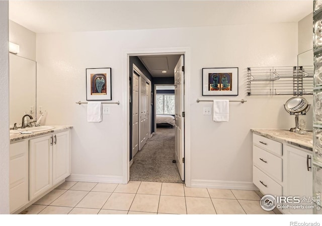 933 Xenon Ct, Golden, CO 80401 - hallway featuring a sink, light tile patterned floors, and baseboards