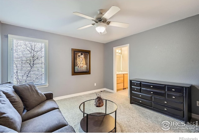 933 Xenon Ct, Golden, CO 80401 - living room with ceiling fan, light colored carpet, and baseboards