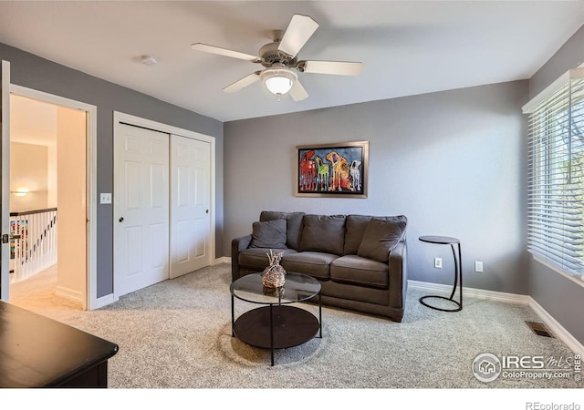933 Xenon Ct, Golden, CO 80401 - living room with carpet flooring, a ceiling fan, and baseboards