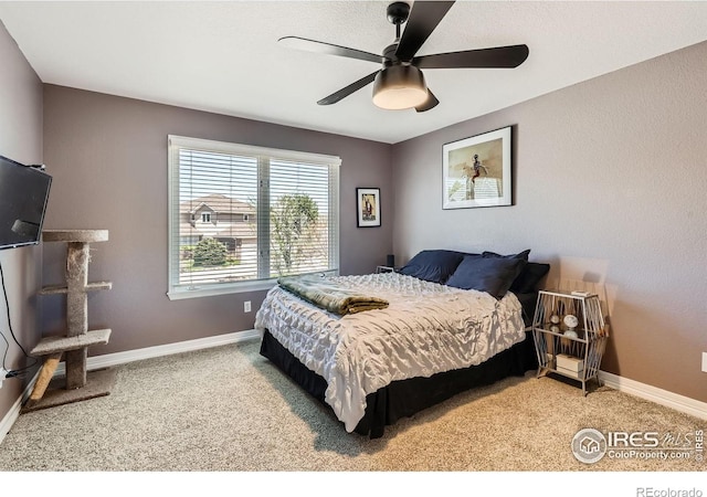 933 Xenon Ct, Golden, CO 80401 - bedroom with carpet flooring, baseboards, and a ceiling fan