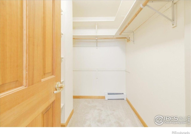 101 Spruce St, Jamestown, CO 80455 - walk in closet with a baseboard radiator and carpet floors