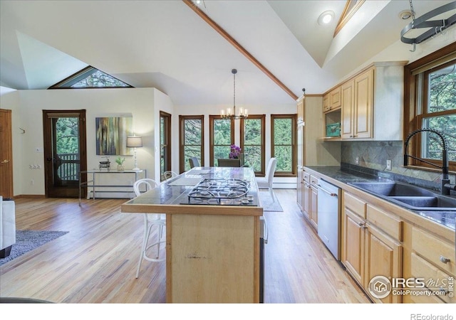 101 Spruce St, Jamestown, CO 80455 - kitchen with a sink, dishwasher, light wood finished floors, light brown cabinets, and a chandelier