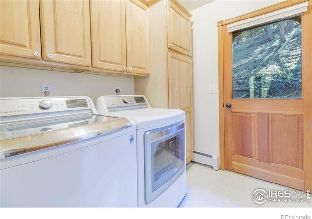 101 Spruce St, Jamestown, CO 80455 - laundry area with washing machine and dryer, a baseboard radiator, cabinet space, and light floors