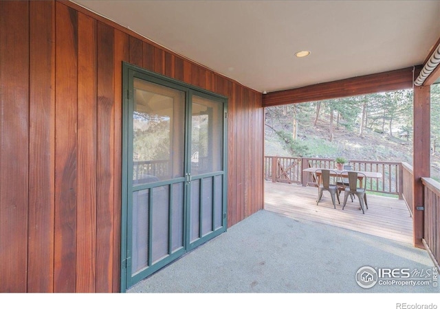 101 Spruce St, Jamestown, CO 80455 - doorway to property with outdoor dining space and a wooden deck