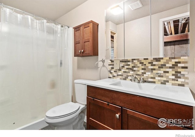 7037 Raleigh St, Wellington, CO 80549 - bathroom featuring decorative backsplash, toilet, a shower with curtain, and vanity