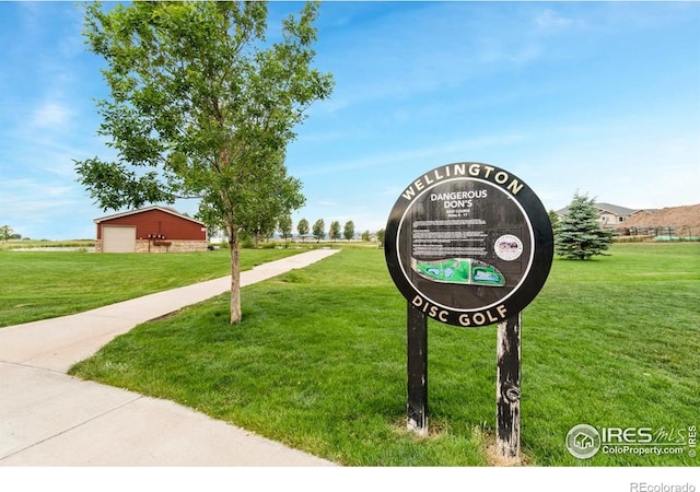 7037 Raleigh St, Wellington, CO 80549 - surrounding community with a garage and a yard