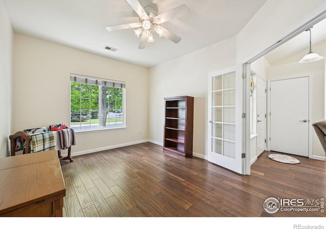 office area featuring wood finished floors, french doors, ceiling fan, and baseboards